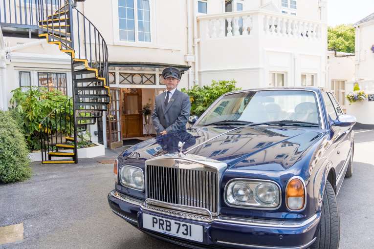 Rolls Royce Chauffeur Outside Belmont Hotel