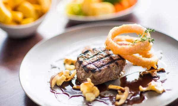 Belmont Hotel Restaurant Dining Fillet Steak with Forest Mushroom and Crispy Onion Rings