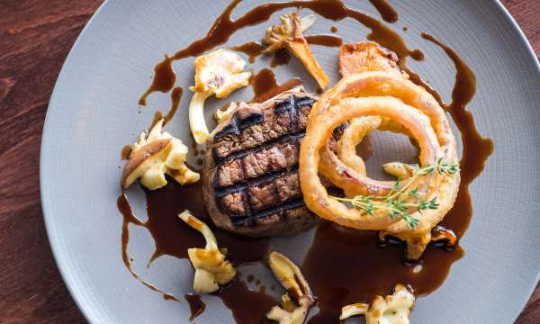 Belmont Hotel Restaurant Dining Fillet Steak with Forest Mushroom and Crispy Onion Rings
