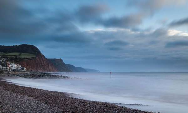 Stormy Winter Seafront and Pebble Beach at Sidmouth South Devon