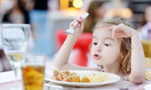 Child dining at restaurant