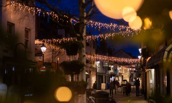 Sidmouth High Street with Festive Lights at Evening 