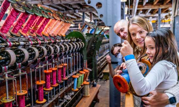 Family looking at wool in Coldharbour Mill 