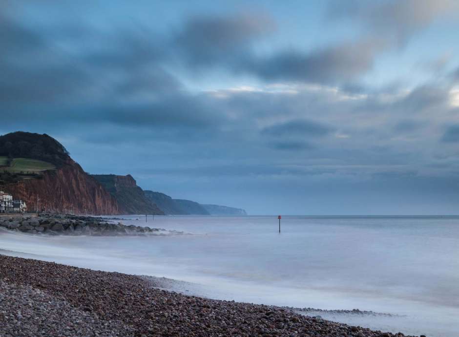 Stormy Winter Seafront and Pebble Beach at Sidmouth South Devon